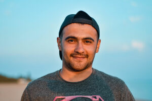Young man smiling and relieved