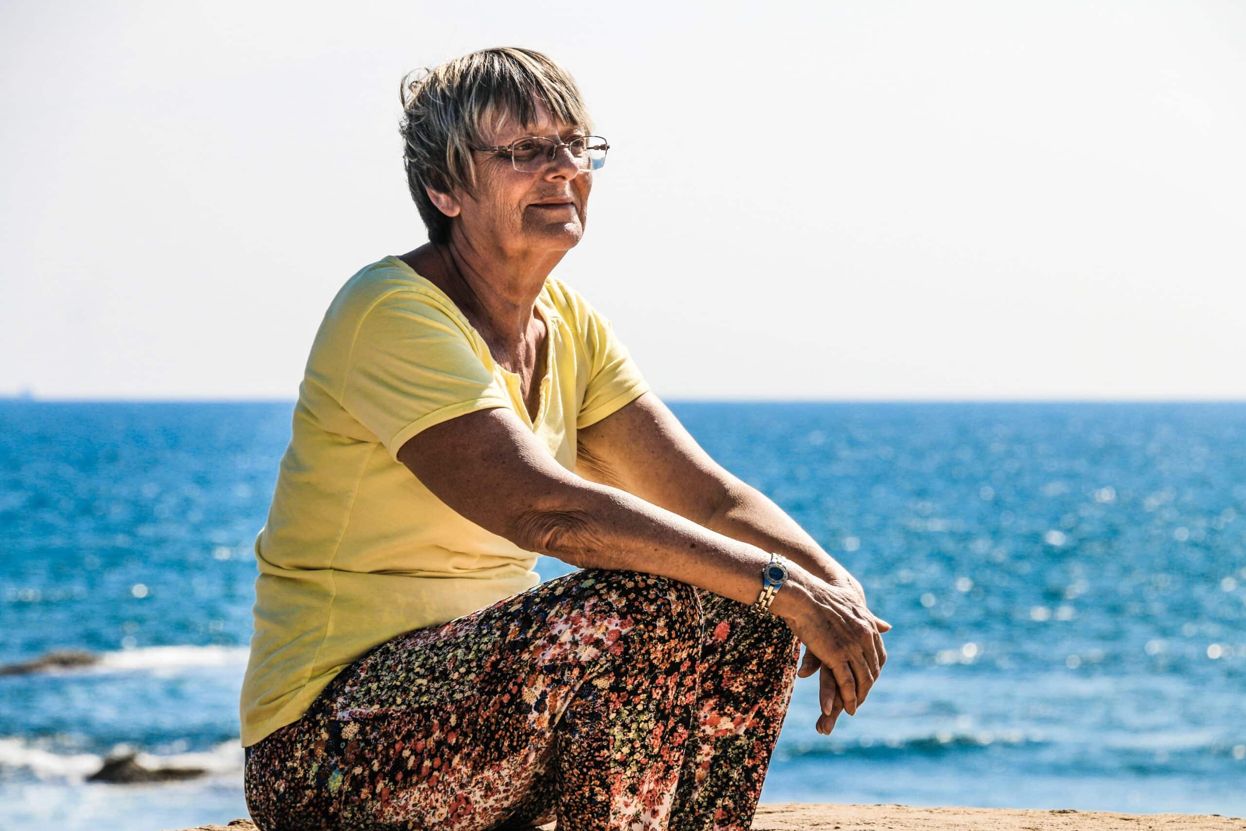 women looking into the distance at the ocean